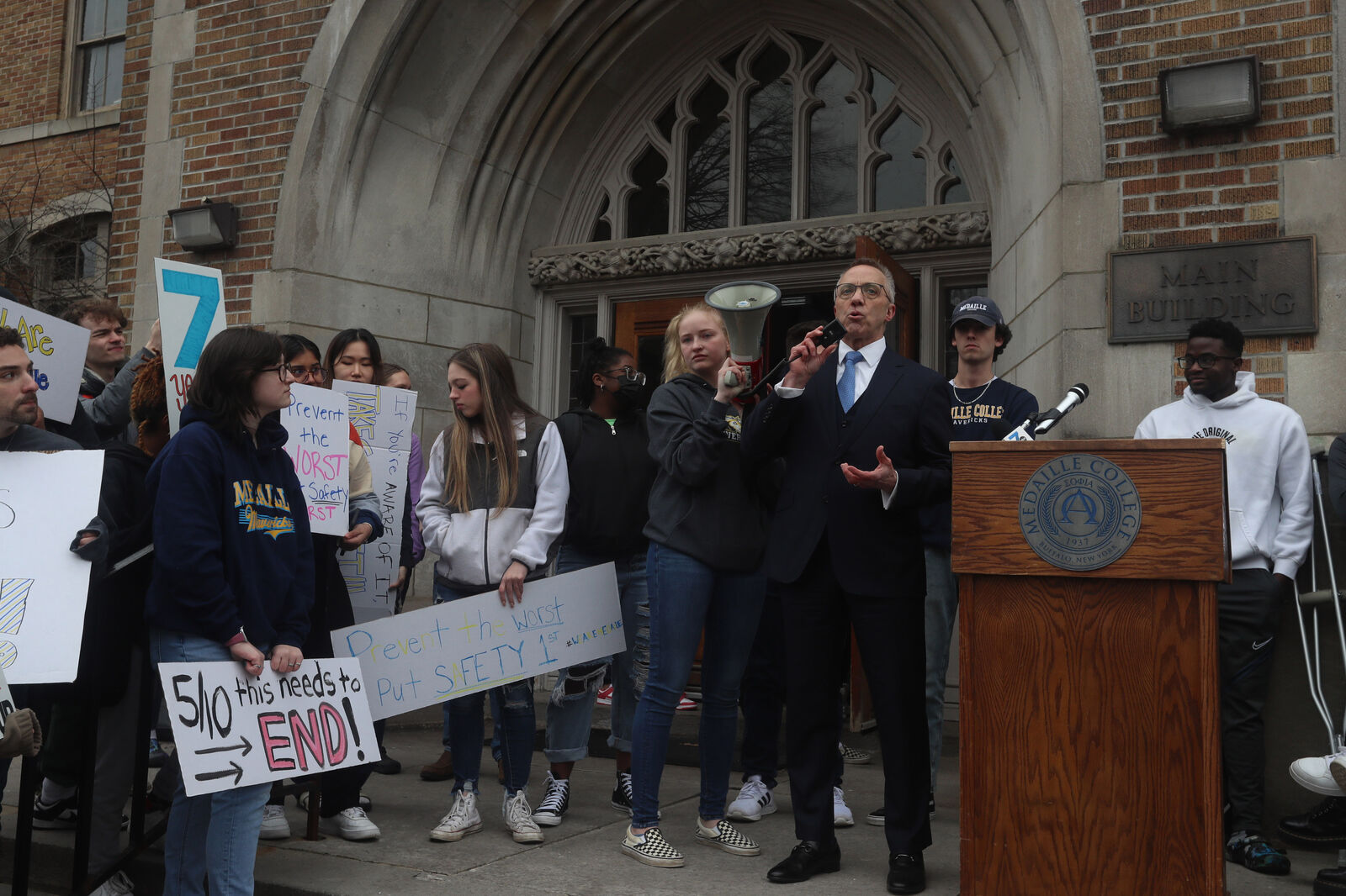 Medaille President Macur speaks at protest